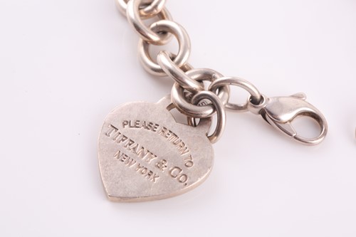 Lot 98 - Tiffany & Co. A silver bracelet, with...