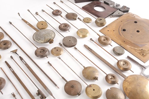 Lot 165 - A collection of assorted clock and watch parts,...