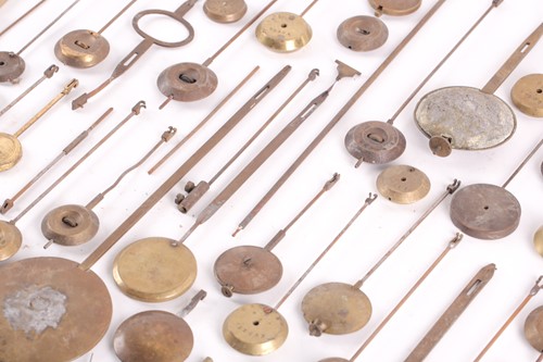 Lot 165 - A collection of assorted clock and watch parts,...
