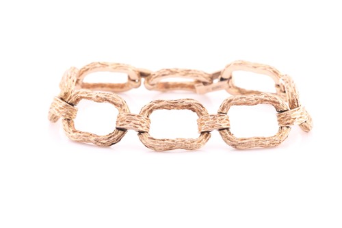Lot 93 - A 9 carat gold bracelet; composed of large...