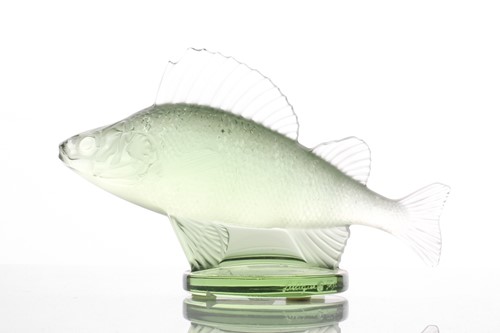 Lot 419 - A Lalique green frosted glass perch car mascot...