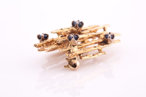 Lot 295 - A five stone sapphire brooch, of naturalistic...