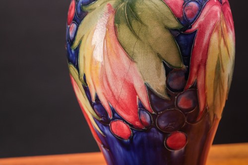 Lot 137 - A Walter Moorcroft baluster vase in the leaf...