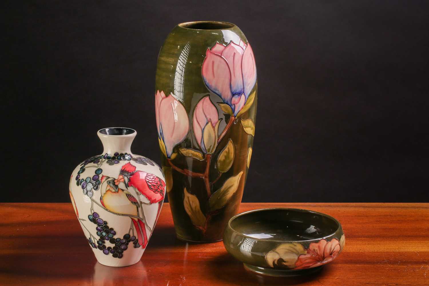 Lot 133 - A tall Walter Moorcroft vase in the Magnolia...
