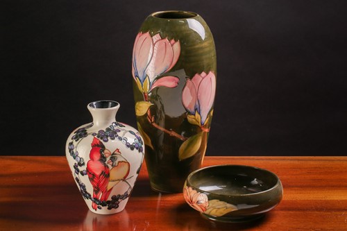 Lot 133 - A tall Walter Moorcroft vase in the Magnolia...