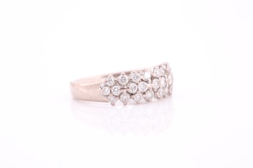 Lot 269 - An 18ct white gold and diamond ring, the band...