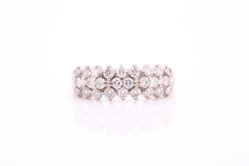Lot 269 - An 18ct white gold and diamond ring, the band...