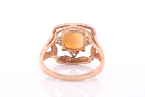 Lot 78 - A 9ct yellow gold and opal ring, set with a...
