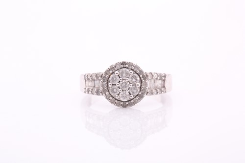 Lot 54 - A 9ct white gold and diamond cluster ring, set...