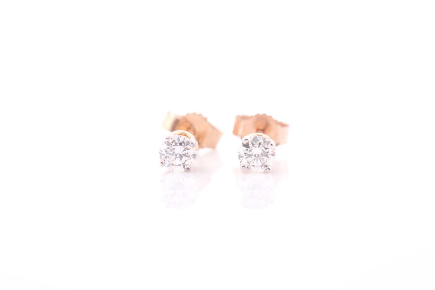 Lot 103 - A pair of 9ct yellow gold and diamond ear...