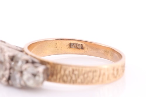Lot 169 - An 18ct yellow gold textured band, later...