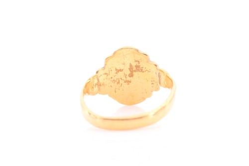 Lot 64 - A yellow metal signet ring, possibly Indian,...