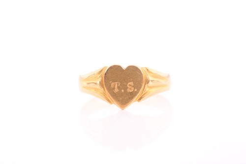 Lot 271 - A yellow metal signet ring, the heart-shaped...
