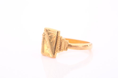 Lot 200 - A yellow metal signet ring, with rectangular...