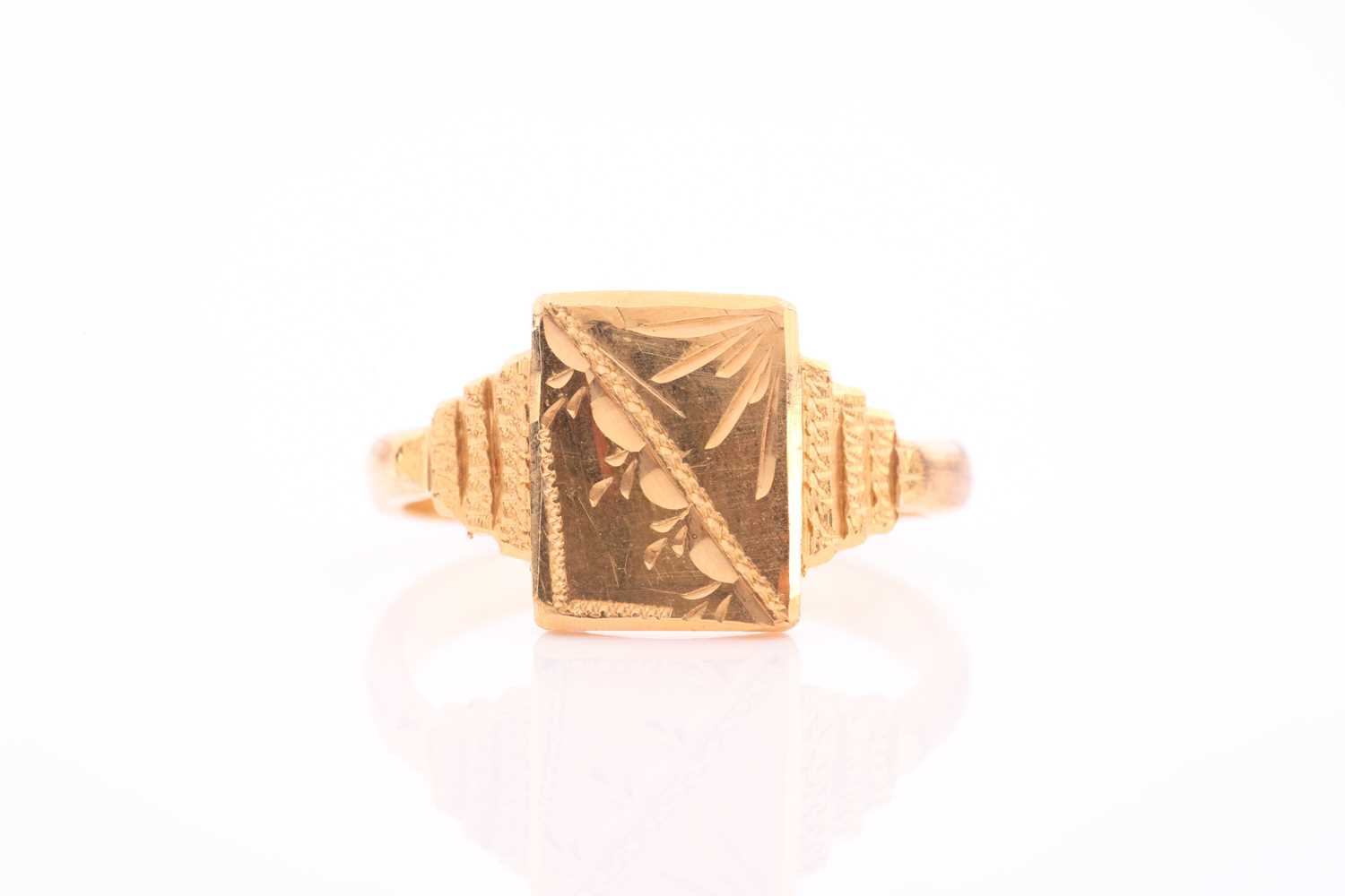 Lot 200 - A yellow metal signet ring, with rectangular...