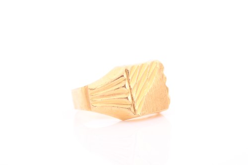 Lot 259 - A yellow metal signet ring, with engraved...
