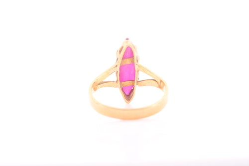 Lot 294 - A yellow metal and red paste stone ring, set...