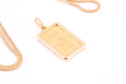 Lot 164 - An 18ct yellow gold chain necklace, suspended...