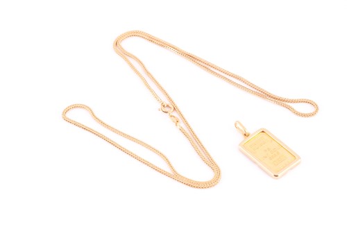 Lot 164 - An 18ct yellow gold chain necklace, suspended...