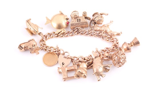 Lot 41 - A 9 carat gold charm bracelet, the curb...