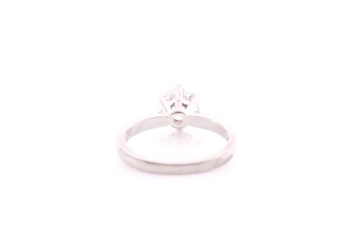 Lot 300 - A single stone diamond ring; the round...