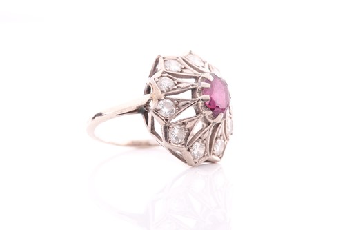 Lot 360 - An Art Deco ruby and diamond cluster ring; the...