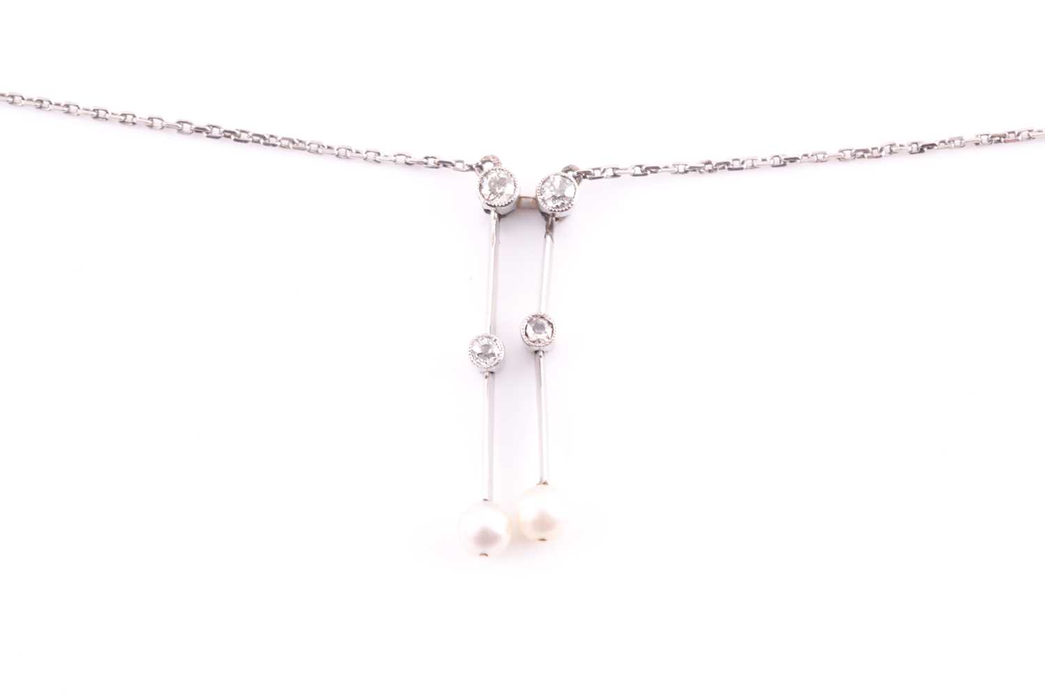 Lot 258 - A diamond and pearl lavaliere drop pendant...