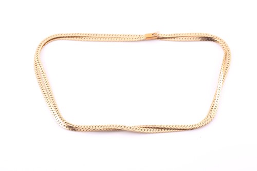 Lot 357 - A yellow metal herringbone chain necklace, the...