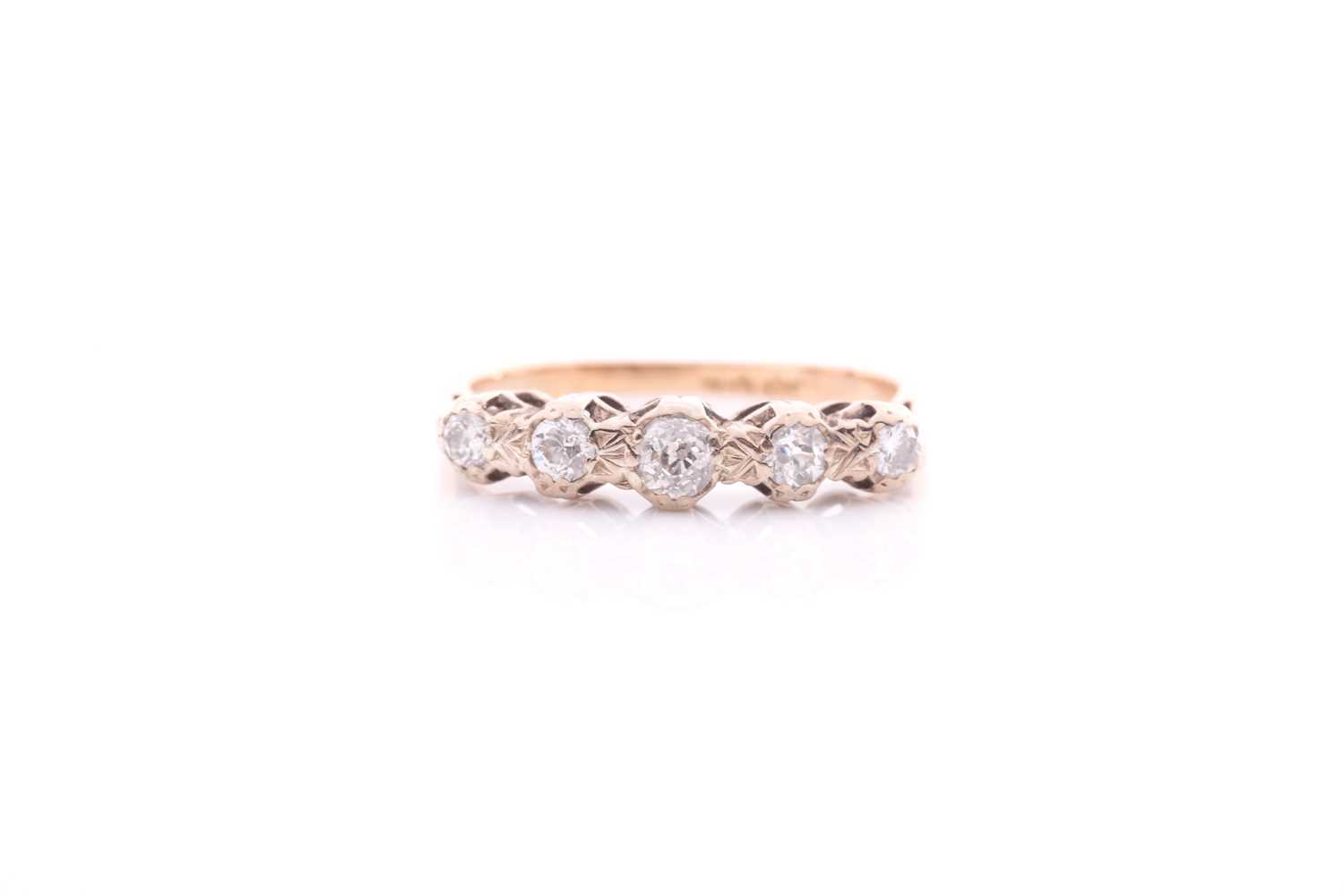 Lot 33 - A five stone half hoop diamond ring; the...