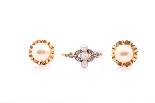 Lot 216 - An Edwardian diamond and pearl ring; with...