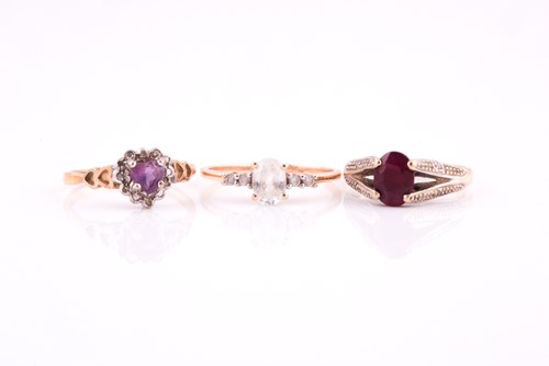 Lot 188 - A single stone ruby ring; the oval cut ruby...