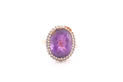Lot 262 - An 18ct yellow gold, amethyst, and diamond...