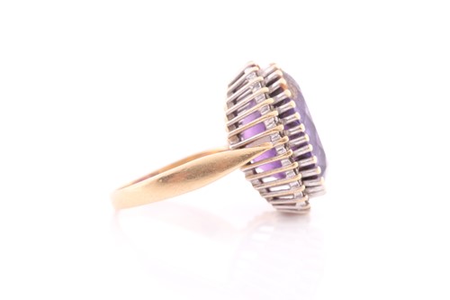 Lot 262 - An 18ct yellow gold, amethyst, and diamond...