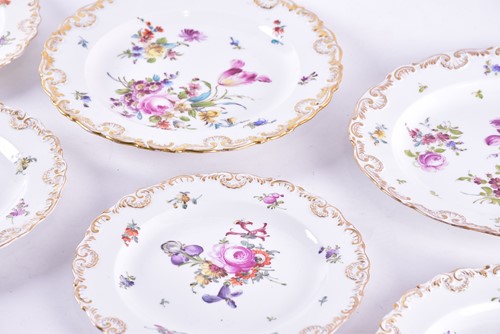 Lot 146 - A set of seven hand-painted Meissen plates,...