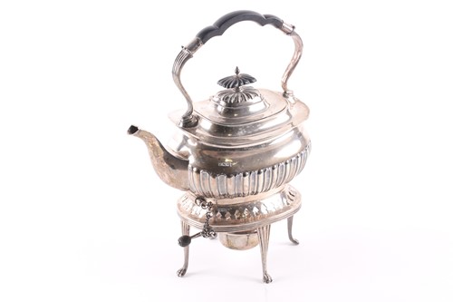 Lot 412 - An Edwardian silver spirit kettle and stand....