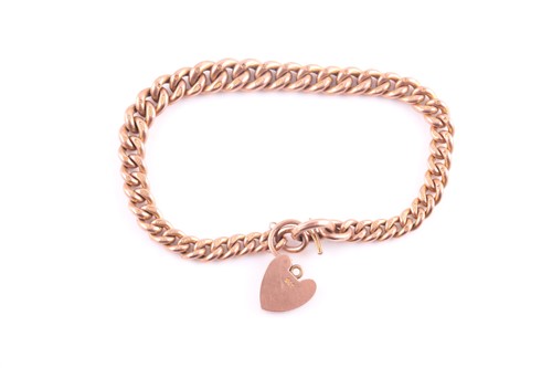 Lot 114 - A 9ct rose gold curb-link bracelet, fastened...