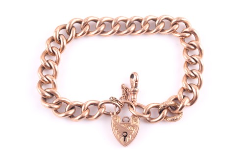 Lot 212 - A 9ct rose gold curb-link bracelet, with...