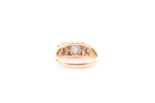 Lot 166 - An 18ct yellow gold, diamond, and sapphire...