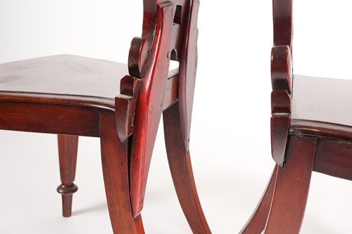 Lot 70 - A pair of Victorian mahogany hall chairs. With...