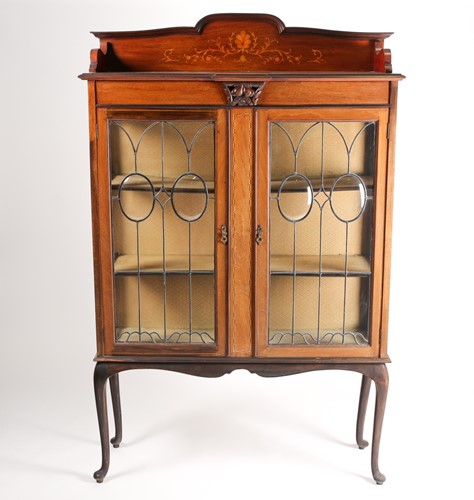 Lot 217 - An early 20th century inlaid mahogany display...