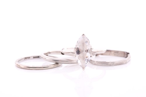 Lot 102 - A platinum shaped wedding band ring, size R...