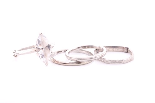 Lot 102 - A platinum shaped wedding band ring, size R...