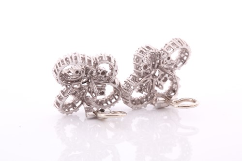 Lot 245 - A pair of 18ct white gold and diamond...