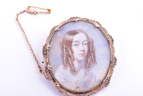 Lot 65 - An early 19th century portrait miniature in a...