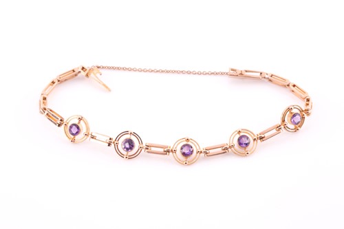 Lot 326 - A 15ct yellow gold and amethyst bracelet, set...