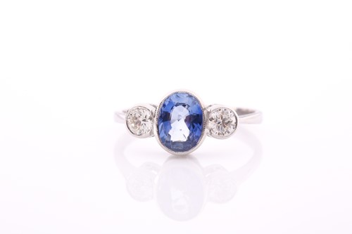 Lot 249 - A platinum, diamond, and sapphire ring, set...