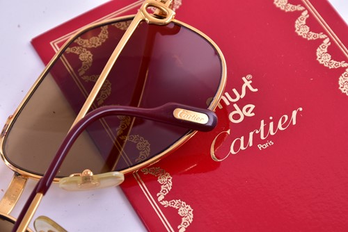 Lot 370 - A Must de Cartier gilt metal pen, in original...
