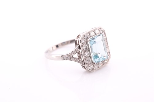 Lot 117 - A platinum, diamond, and aquamarine ring, set...