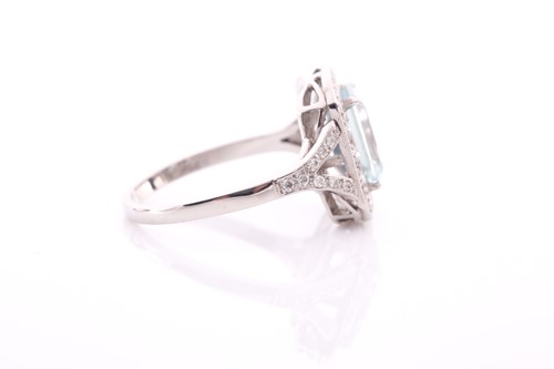 Lot 117 - A platinum, diamond, and aquamarine ring, set...