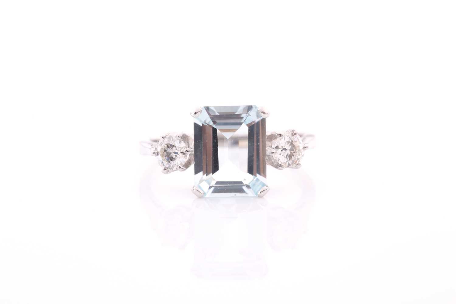 Lot 4 - A platinum, diamond, and aquamarine ring, set...